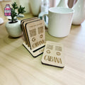 Small wooden QR review block shown beside its display stand