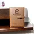 Brown personalised leather A5 binder with an engraved business logo
