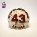 Round wooden years of service sign with raised number 43