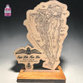 Wooden Gibraltar and RAF leaving gift on a display stand