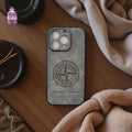 Dark personalised phone case with engraved circular emblem