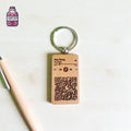 Wooden Spotify and QR keyring attached to a metal ring
