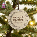 Round wooden merry and married Christmas ornament hanging on a tree