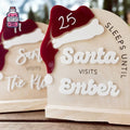 Wooden sleeps until Santa visits countdown with Santa hat detail