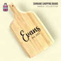 Bamboo chopping board with handle engraved with a family name