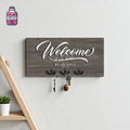 Grey wooden welcome key hanger with metal hooks