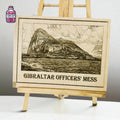 Engraved wooden presentation board showing a Gibraltar landmark