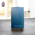 Blue hardback diary with a personalised name on the cover